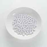 BD00084-01-silver-letter-white-opaque-coin-alphabet-beads-single-a-4×7mm